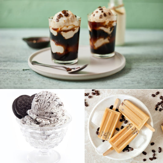 Two glasses of coffee dessert topped with whipped cream and chocolate beans sit on a plate, accompanied by a bowl of cookies and cream ice cream and a plate of coffee-flavored popsicles.