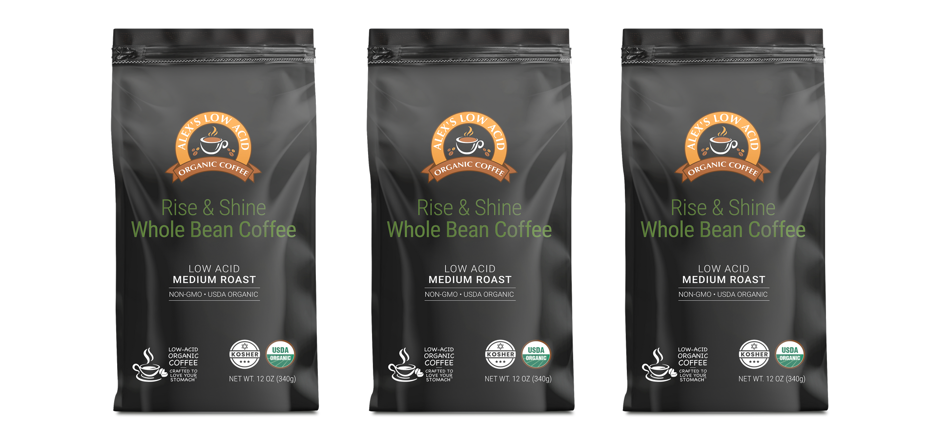 Three 12oz black bags of Alex's Low-Acid Organic Coffee™ - Rise and Shine Whole Bean by Alex's Low Acid Coffee, featuring low acid, medium roast, non-GMO labels, certification logos, and a coffee cup graphic on the front.