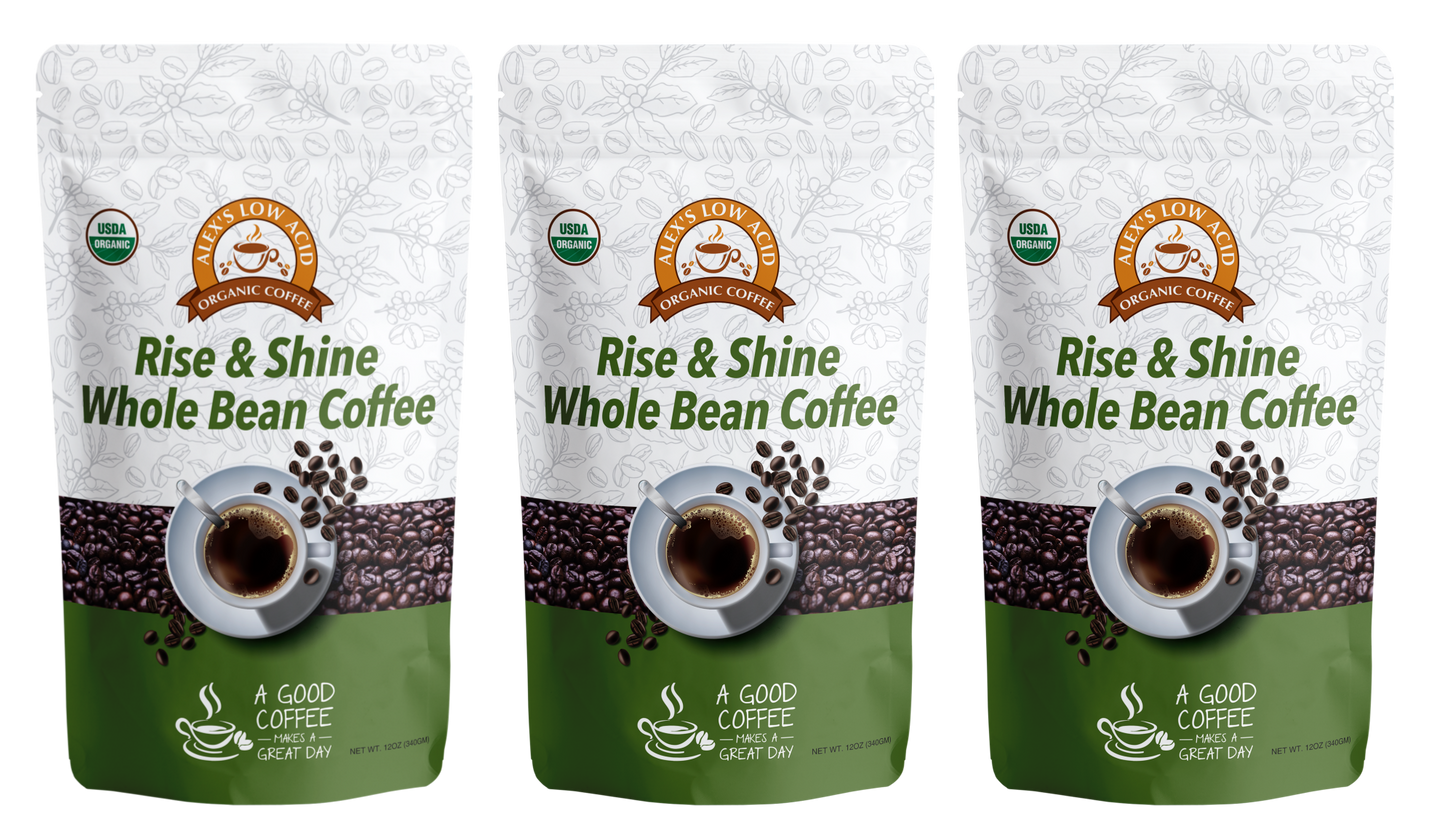 Three packs of Alex's Low-Acid Organic Coffee™ - Rise and Shine Whole Bean (12oz) from Alex's Low Acid Coffee. The packaging features a coffee cup, beans, green base, organic certification, and promotes low-acid for gentle heartburn relief.