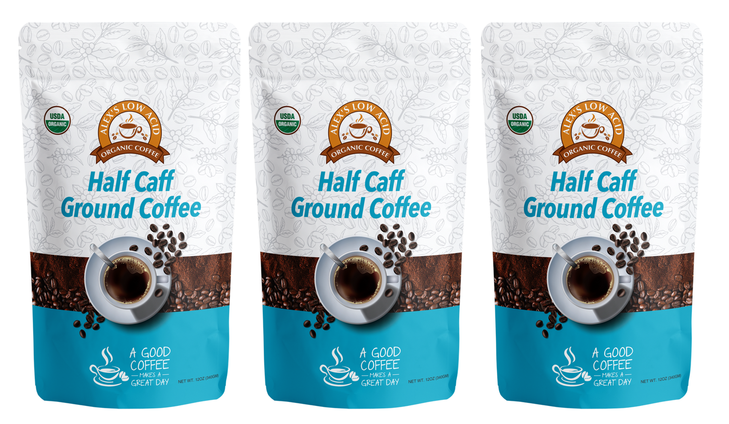 Three identical bags of Alex's Low-Acid Organic Coffee™ - Half Caff Fresh Ground (12oz) from Alex's Low Acid Coffee stand side by side, each with a coffee cup, beans, blue and white design, text, and an organic certification seal for low-acid coffee.
