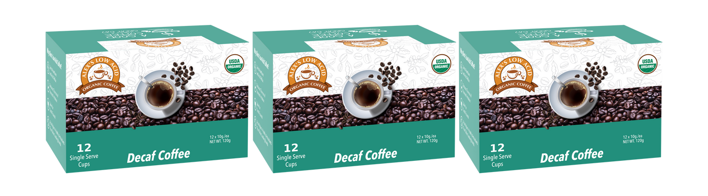Three identical green and white boxes of Alex's Low-Acid Organic Coffee™ K-Cups - Decaf by Alex's Low Acid Coffee, each with a cup of coffee amid beans. Each organic, low-acid box contains 12 single-serve cups and displays the certification label.