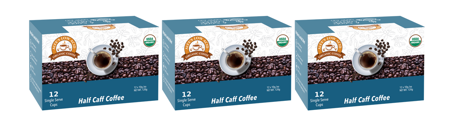 Three boxes of Alex's Low-Acid Organic Coffee™ K-Cups - Half Caff by Alex's Low Acid Coffee are shown. Each blue and white box holds 12 pods, featuring USDA organic labels and promoting low-acid, smooth-tasting coffee.