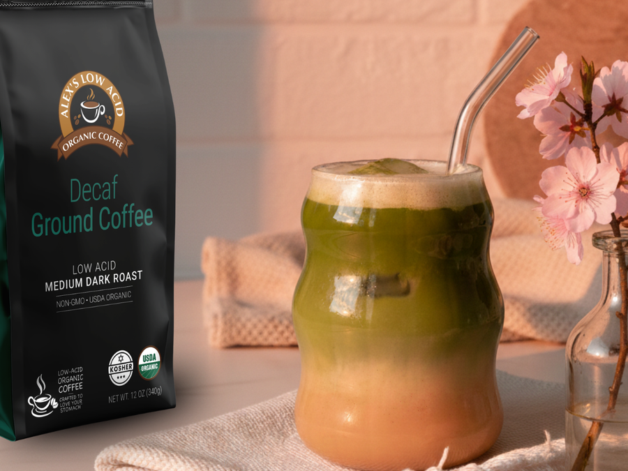 Bright green iced spring latte made with low acid coffee, matcha, and vanilla in a clear glass with ice.