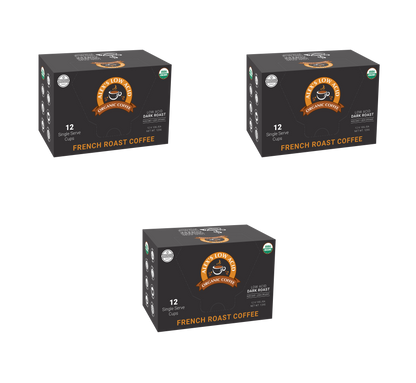 Three boxes of Alex's Low-Acid Organic Coffee™ Single Serve Cups - French Roast, each with 12 pods, are displayed on a white background. The black boxes feature orange and white branding and a coffee cup logo from Alex's Low Acid Coffee.