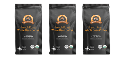 Three bags of Alex's Low-Acid Organic Coffee™ - French Roast Whole Bean (12oz) by Alex's Low Acid Coffee are shown side by side, featuring black packaging with orange, white text, coffee cup graphics, and heartburn relief certification logos.