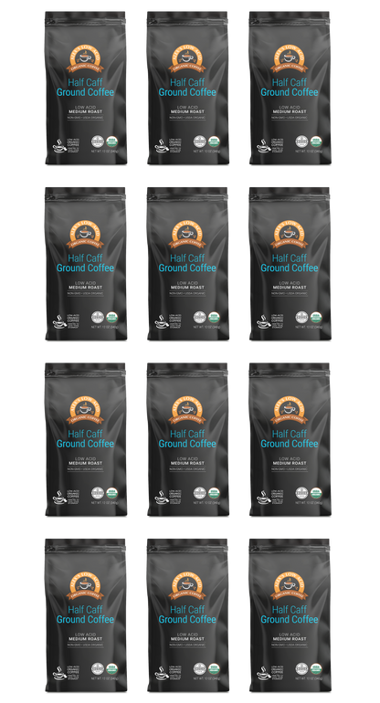Twelve identical bags of Alex's Low-Acid Organic Coffee™ - Half Caff Fresh Ground (12oz) by Alex's Low Acid Coffee, arranged in a 3 by 4 grid on a white background. The black bags feature the brand logo, low acid certification, and premium packaging.