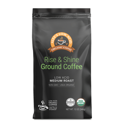 A 12oz bag of Alex's Low Acid Coffee™ - Rise and Shine Fresh Ground. This medium roast is USDA organic, kosher, non-GMO, low-acid, and stomach-friendly.