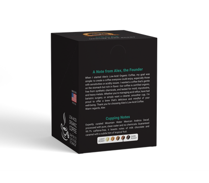 A black box of Alex's Low-Acid Organic Coffee™ Decaf Coffee Steep Bags features the founder’s note, an American flag, USDA organic seal, and cupping notes for a light roast organic arabica decaf with dark peach flavors.