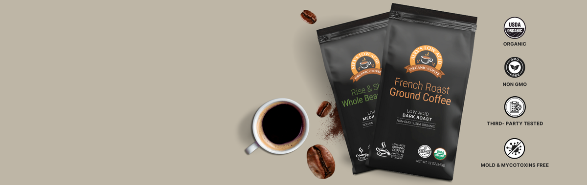 Two bags of organic coffee, labeled "Rise & Shine Whole Bean" and "French Roast Ground Coffee," are displayed alongside a cup of coffee and coffee beans on a light beige background.