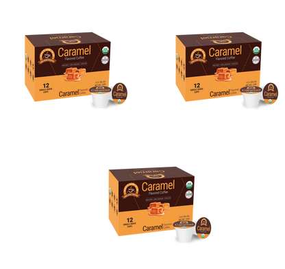 Three boxes of Alex's Low Acid Organic Coffee™ Single Serve Flavored Cups - Caramel from Alex's Low Acid Coffee are shown with pods and lids in front. Each box contains 12 organic, low acid pods ideal for those needing coffee for heartburn.