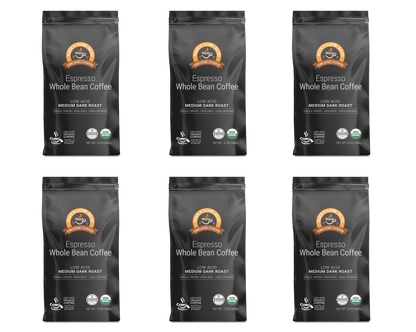 Six bags of Alex's Low Acid Organic Coffee™ - Espresso Whole Bean (12oz) by Alex's Low Acid Coffee, labeled Medium Dark Roast, are arranged in two rows of three. Each black bag features a brown circular logo and certification icons at the bottom.